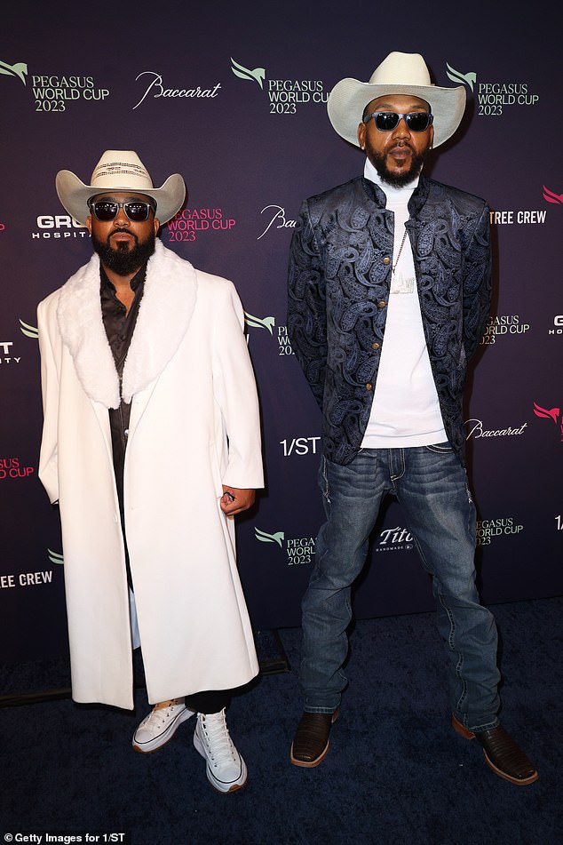 Ready to Ride: Two members of the Compton Cowboys equestrian club were in attendance for the race, wearing nearly matching wide-brimmed hats.