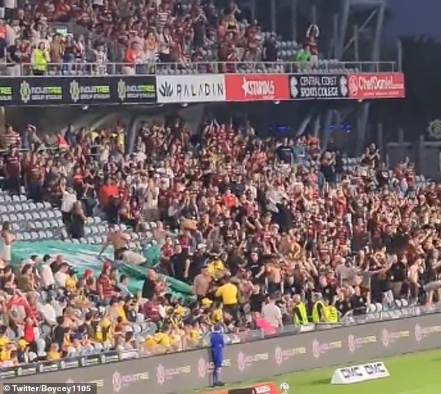 A video posted to Twitter Saturday night shows Wanderers fans yelling as they appear to be moving aggressively towards Mariners fans.