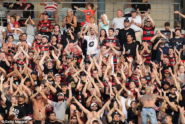 Wanderers fans made headlines in November last year for wild scenes outside the Allianz Stadium in November after their clash with Sydney FC (Wanderers pictured celebrating on Saturday night)