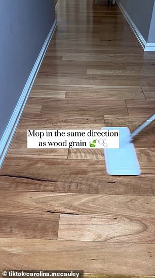 Carolina soaks her mop in the mixture and recommends mopping in the same direction as the grain of the wood.