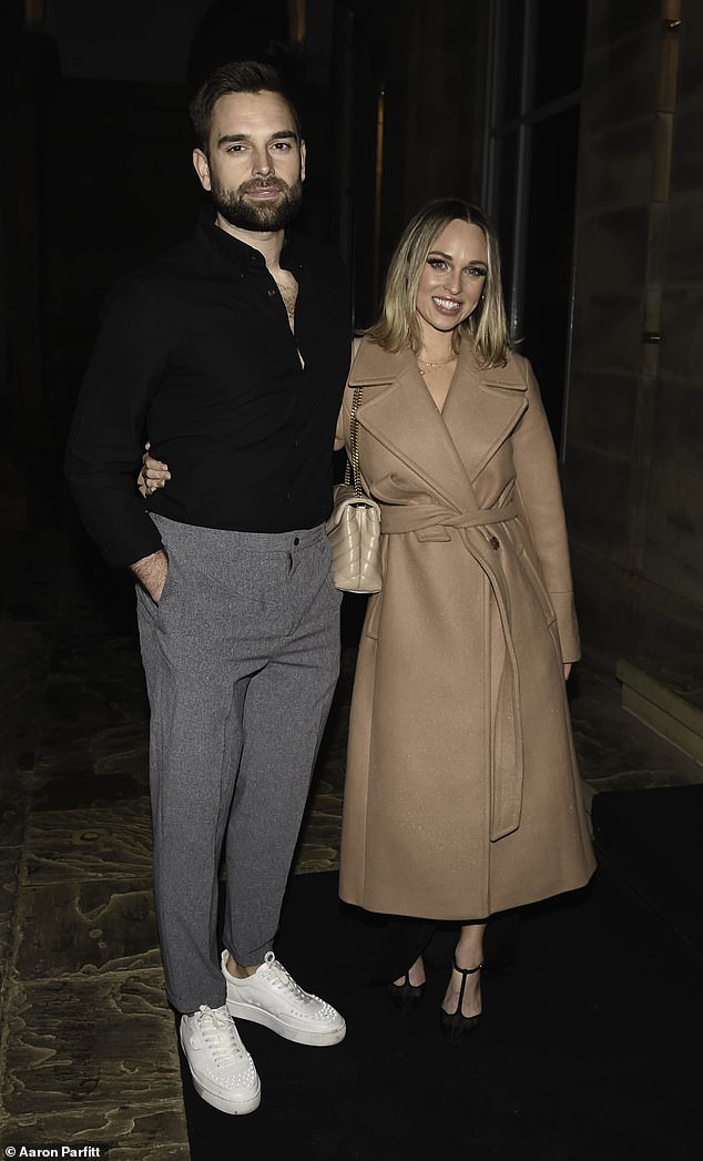 Smitten: The Hollyoaks star, 35, put on a charming display with her property developer boyfriend, 33, as they arrived at the Radisson Hotel in Manchester for the star-studded bash