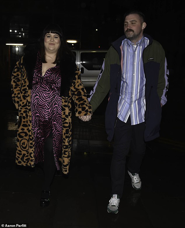 Birthday Party: Also in attendance was Jessica Ellis, who put on a colorful display in a purple print dress and fluffy animal print jacket.