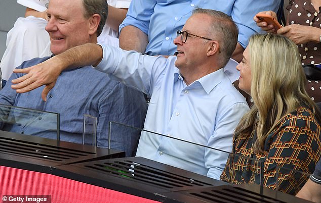 Mr Albanese (centre photo) appears to demonstrate a good game point to partner with Ms Haydon (pictured right) as former Liberal Treasurer Tim Costello (pictured left) listens