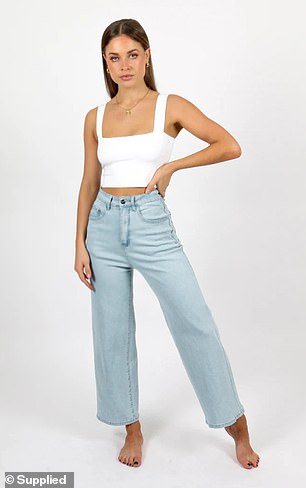 The wide leg jean is made with functional front and back pockets, and is made with a blend of cotton and elastane.