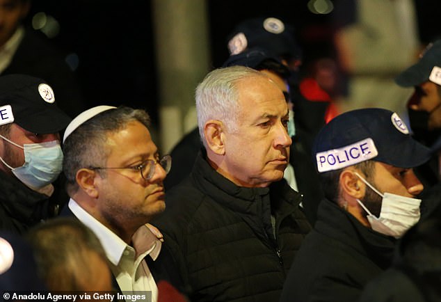 Israeli Prime Minister Benjamin Netanyahu and Israel's National Security Minister Itamar Ben-Gvir investigate the crime scene.