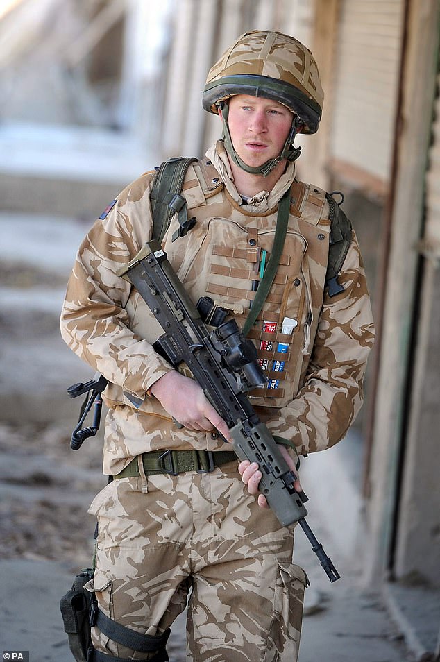 Prince Harry on patrol in the deserted town of Garmsir, southern Afghanistan, in 2008