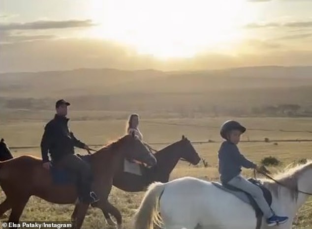 The group rode alongside the local animals, including zebras, who looked on as they trotted.