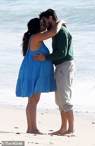 PDA: During their romantic outing, they showed their love and shared a kiss on the beach