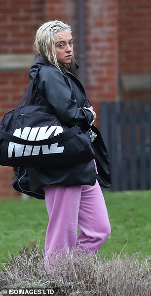 Off she goes: The Coronation Street star was carrying two large sports bags as she made her way to the studio