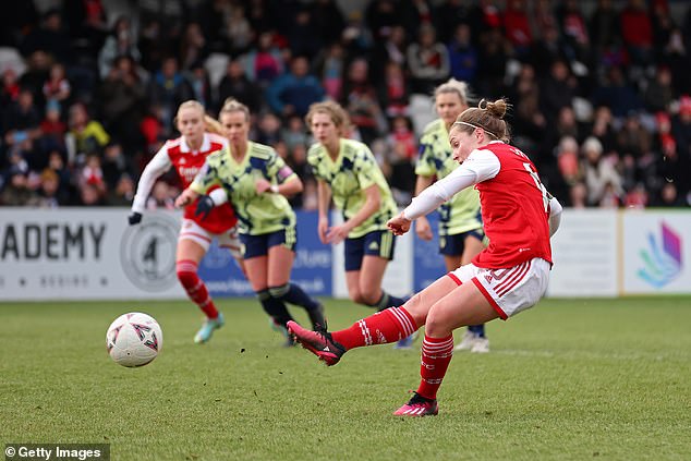 Kim Little scores Arsenal's third goal from the penalty spot in the match at Meadow Park