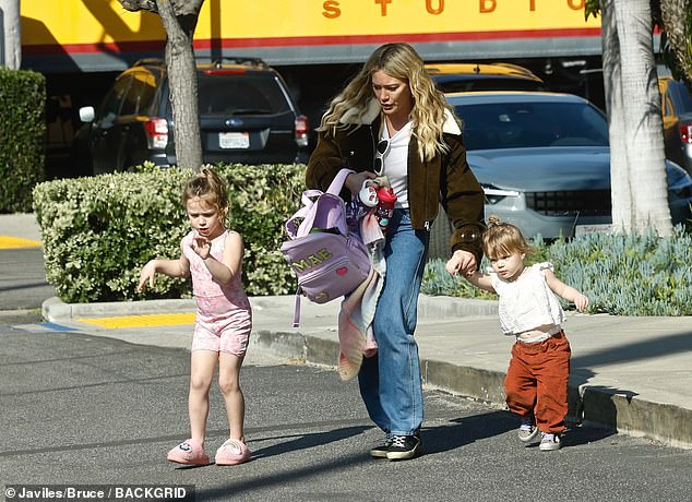 Children: Duff was seen with her two daughters early in the morning: four-year-old Banks and one-year-old Mae.