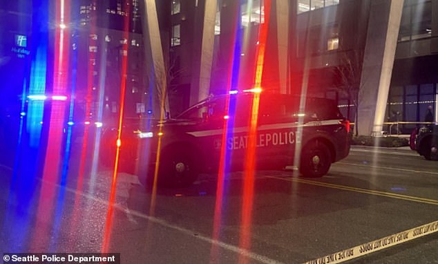 A Seattle police SUV at the intersection where Kandula was struck Monday night