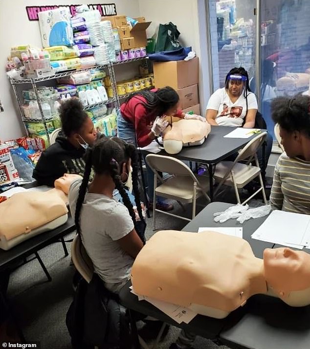 Tyra also encourages attendees to set goals, as well as counseling on topics like financial literacy, CPR (pictured), nutrition, and personal hygiene.