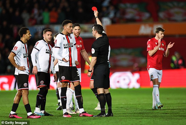 Young striker Daniel Jebbison was sent off for an off-the-ball incident, colliding with Ben Tozer