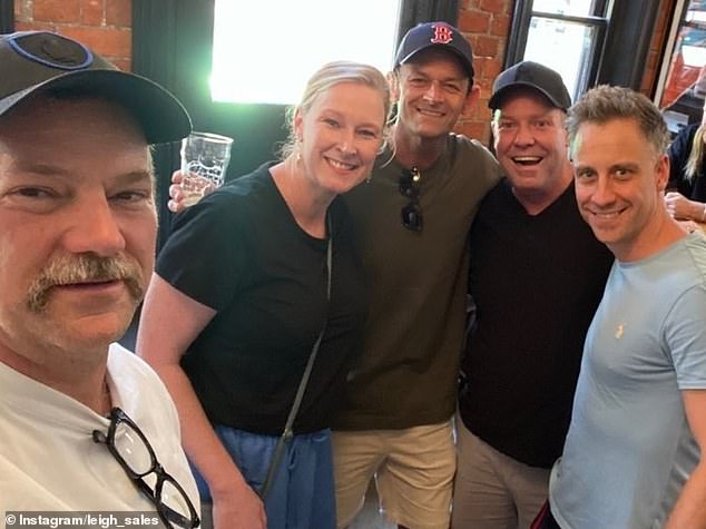 Earlier this month, a photo surfaced of Walker (far right) in the pub with Bickmore's former The Project co-host Peter Helliar (second from right), ABC presenter Leigh Sales (second from left), the comedian Anthony Lehmann (left) and cricketer Adam.  Gilchrist (center)