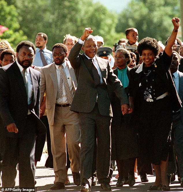 Harry and Meghan say their recent Netflix documentary was inspired by former South African president, the late Nelson Mandela.  He is pictured with his then-wife Winnie after her release from Victor Prison, Cape Town, in 1990.