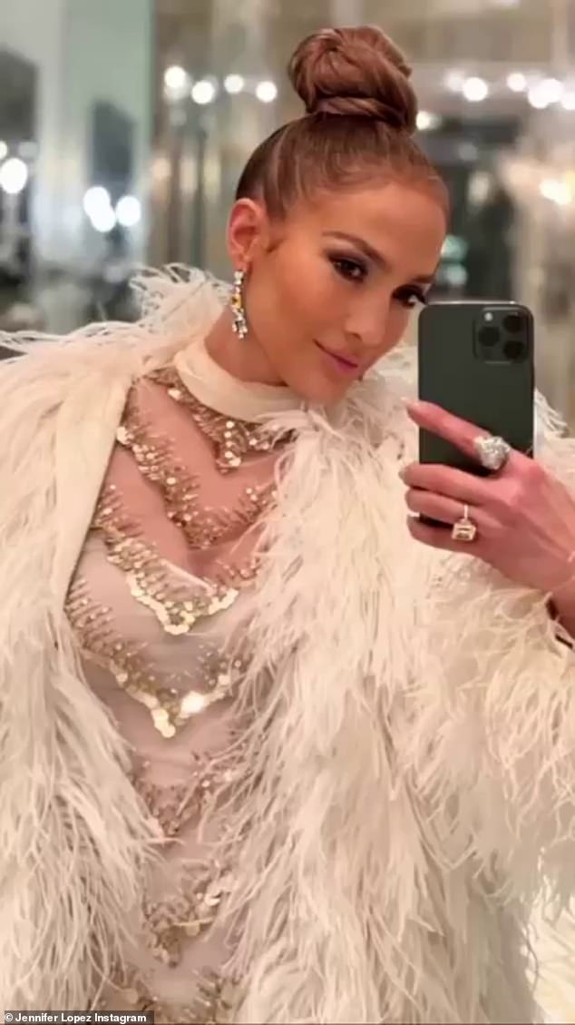 Star power: The 53-year-old shared photos of her face and outfit while also including videos in front of a mirror