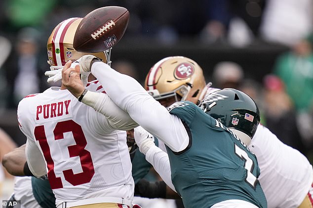 Philadelphia Eagles linebacker Haason Reddick, right, causes a fumble by San Francisco 49ers quarterback Brock Purdy during the first half of the NFC Championship NFL football game between the Philadelphia Eagles and the San Francisco 49ers on Sunday.