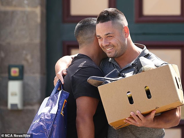 The former NRL superstar was all smiles when he met a friend while leaving jail in February last year after his conviction was overturned and a new trial ordered.