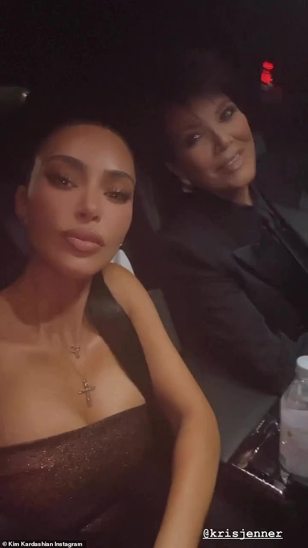 With her mom: Kim also shared a short clip on her Stories as she made her way to the event with her mom Kris Jenner, 67