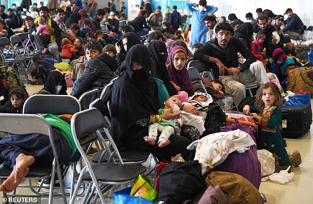 Afghan refugees are processed inside Hangar 5 at the Ramstein airbase in Germany in September 2021.