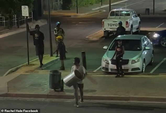 The latest video showed a young Aboriginal man removing a rubbish bin from its stand and carrying it across the road towards the pub like a weapon.