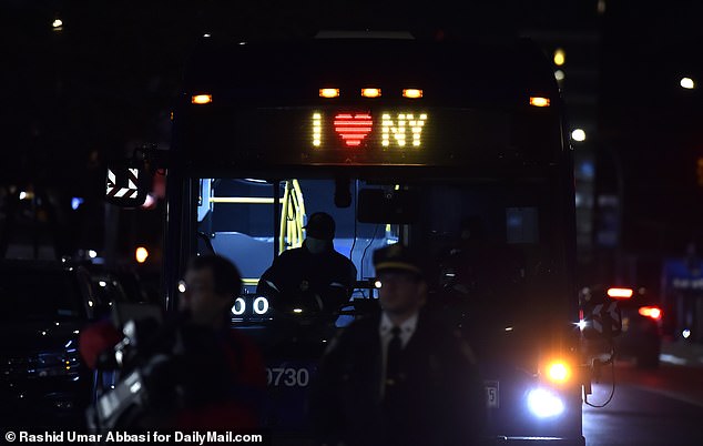 A New York City bus departs for the Brooklyn cruise terminal on Sunday night