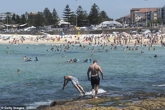 Jack Kessler complained that the handsome residents of Sydney's eastern suburbs made him feel less attractive.  In the photo, people at Bondi Beach.