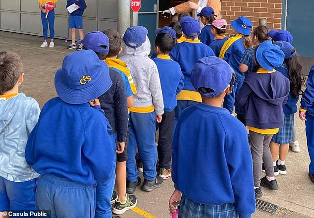 Casula Public School, in western Sydney, is among the worst with its uniform supplier Moorebank Uniforms and Embroidery charging nearly double (Casual Public School students pictured)