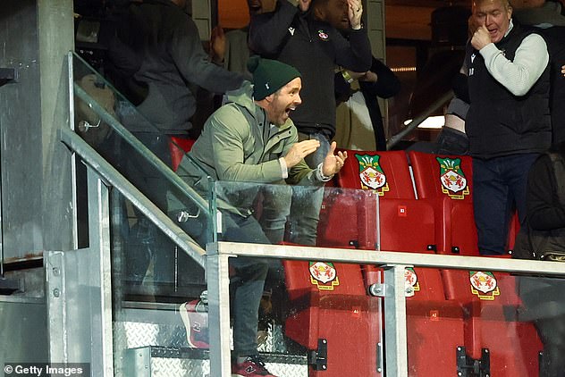 Ups and downs: Ryan was seen celebrating in the stands as the non-League team took the lead twice in the second half.