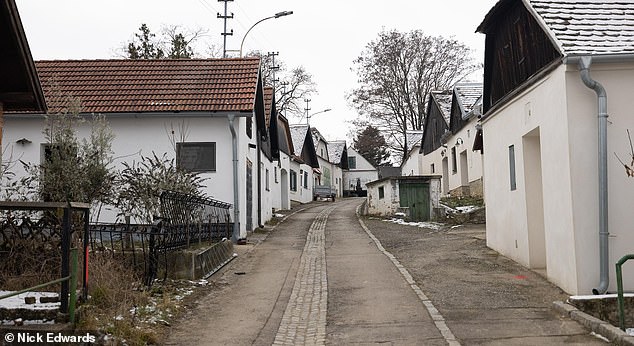 The man was arrested after six British children were found living in an Austrian cellar beneath the remove village Obritz, 60 miles north of the Austrian capital Vienna. Pictured: The road where it is believed Landon had his cellars