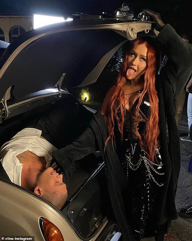 1675075380 985 Christina Aguilera Turns Up The Heat As She Goes TOPLESS