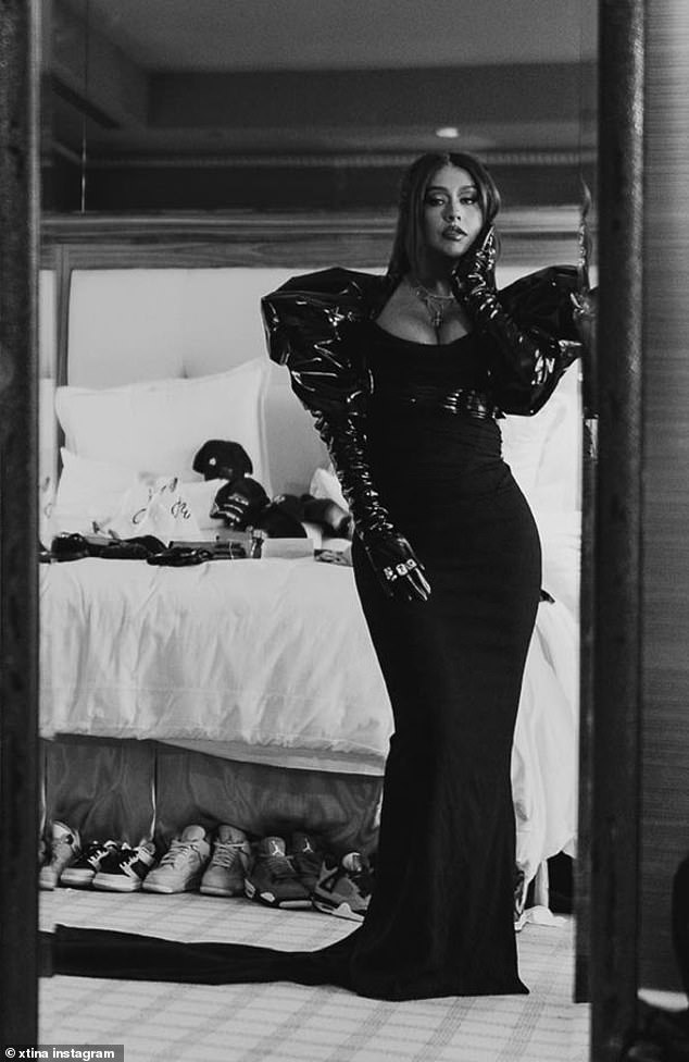 Posture: I can't sit down!  She also shared a behind-the-scenes look at her preparations for the 2021 Latin Grammy Awards ahead of the album's release, where she turned heads in a black latex dress.