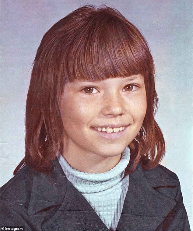 Old times: The singer, who never knew her biological father, in an undated photo from her childhood in Ontario, Canada