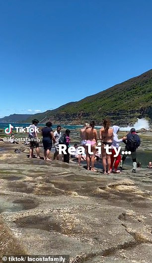 They arrived at the location after a long walk to find crowds of people and stormy conditions that made swimming unpleasant.