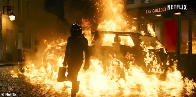Good effects: A car explodes and a man is seen walking towards the fire to get the briefcase