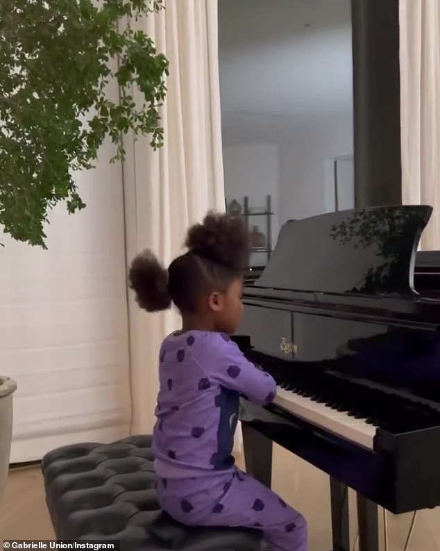 Sweet Moments: While her older sister took plenty of solo glamor photos, little Kaavia played the piano while her father sat on the sofa and captured behind-the-scenes photos of his teenage son.