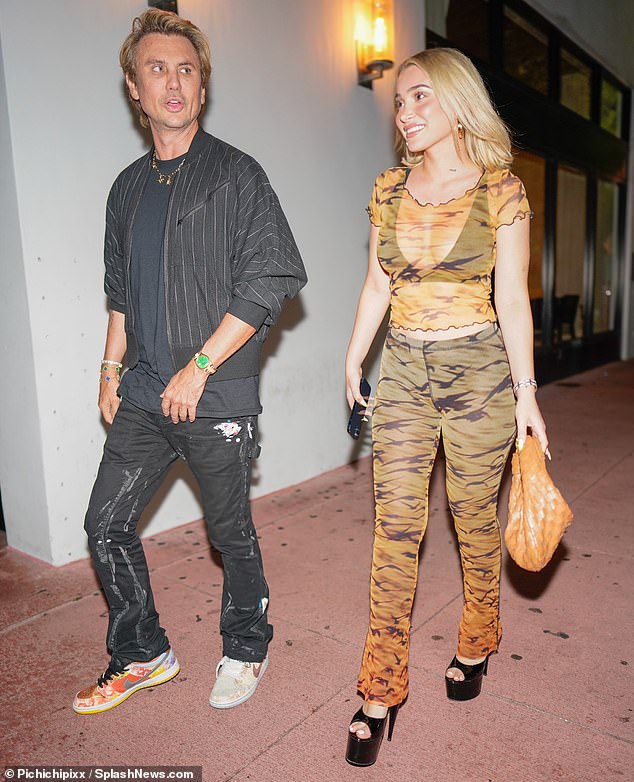 Side by side: The 48-year-old TV personality was joined by designer and social media influencer Camaryn Swanson over dinner at high-end restaurant Papi Steak