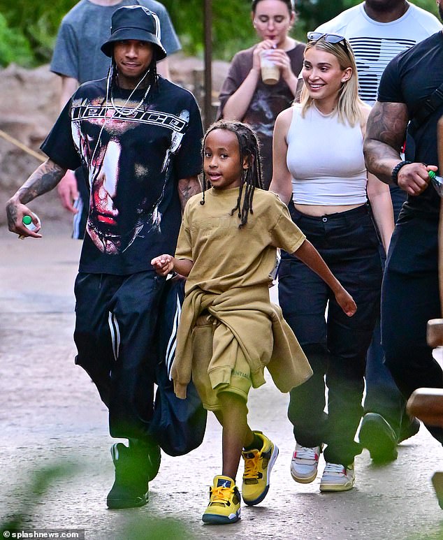 Previously: Swanson is understood to be single following a sour relationship with rapper Tyga (pictured with Tyga and son King Cairo at Disneyland in 2022)