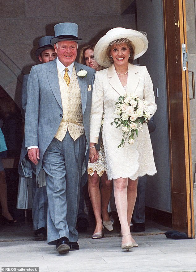 Loss: Dame Esther documentarian Desmond Wilcox's husband died in 2000, something she admitted she had a hard time coming to terms with (pictured together renewing their vows in 1999)