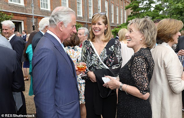 Activist: Received a Damehood for services to children and the elderly in 2015 (pictured in 2017 with King Charles at a reception to mark the Duchess of Cornwall's 70th birthday)