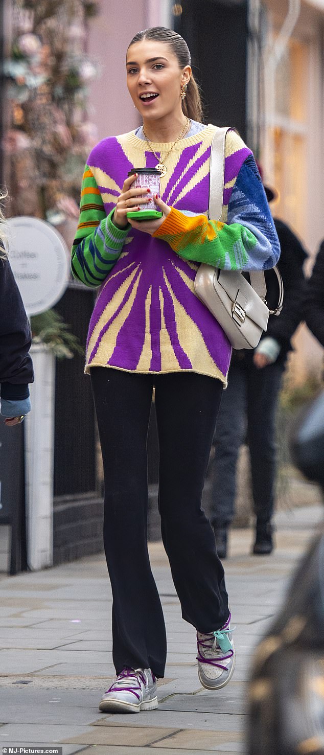 Colourful: Freya Aspinall, 19, pictured wearing a £517 multi-coloured cashmere jumper designed by The Elder Statesman