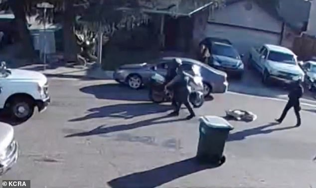 Home surveillance camera footage shows the dog being dragged across the ground