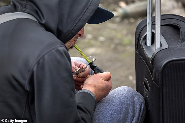 As early as the first weeks of 2023, there have been dozens of overdose deaths in King County, Washington, according to local media.  Pictured: A man in Seattle smokes fentanyl