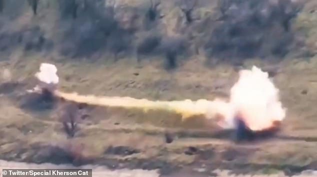 Footage shows the weapon, believed to be a Ukrainian anti-tank missile, tearing through the unit of soldiers and leaving a cloud of smoke.