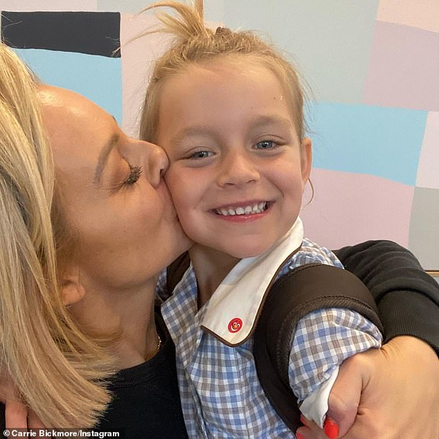 The radio host pointed out how much her seven-year-old daughter had grown when she jumped into her first day of second grade, instead of crying like she did during her high school days.  In the photo: Bickmore and her daughter when she was in preparation.