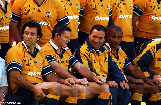 Jones (center) in his first stint as Wallabies manager with the likes of Brendan Cannon, Matt Burke and former captain George Gregan.