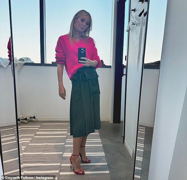 A pop of color: In another photo she shared, the Oscar winner donned a dark green structured skirt paired with a hot pink sweater.