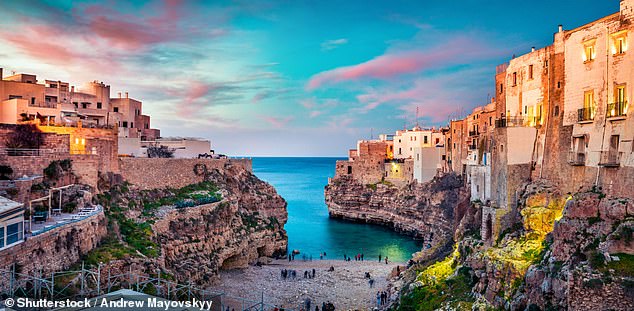 Polignano a Mare in Italy (pictured) was ranked the most welcoming in the world.  It is the second year in a row that a city in Italy has taken first place