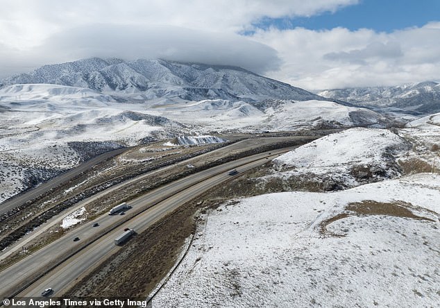 The winter storm blanketed the hillsides along the 5 Freeway in Gorman on Monday.